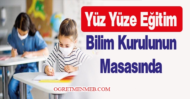 Yüz yüze eğitim bilim kurulunun masasında